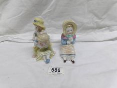 A pair of 19th century continental porcelain figure groups