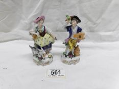 A pair of 19th century continental porcelain figurines