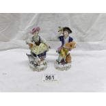 A pair of 19th century continental porcelain figurines