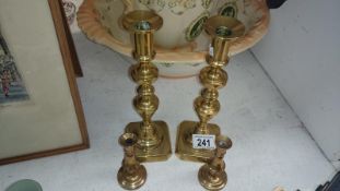 2 pairs of brass candlesticks