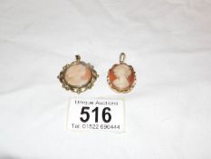 2 shell cameo pendants in yellow metal mounts