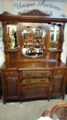 A mahogany mirror back sideboard