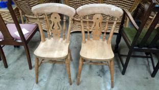A pair of kitchen chairs