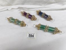 4 coloured glass double ended scent bottles