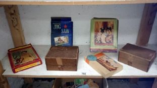 A quantity of vintage jigsaw puzzles