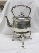 A Victorian silver plated kettle on stand