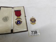 A silver gilt Chamber of Trade past president medal and a Masonic medal