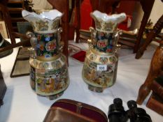 A large pair of Oriental vases