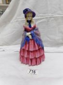 A Royal Doulton figurine, Victorian Lady,
