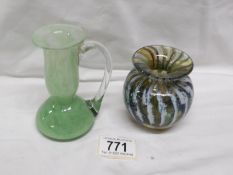 An art glass candleholder and vase