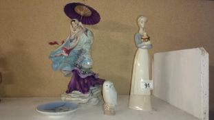 An oriental figure entitled 'Spirit of Purity' and 3 other items