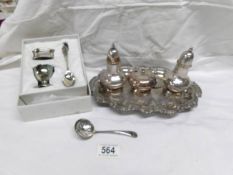 A boxed silver plated Christening set and a silver plate cruet on tray
