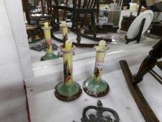 A pair of Torquay pottery candlesticks