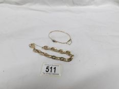A 9ct gold sapphire and diamond bangle and a 9ct gold gate bracelet with padlock