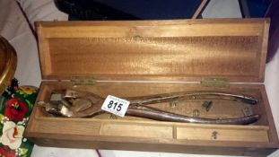 A cased possibly branding tool by Arnold & Sons London