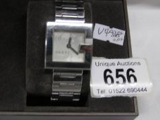 A fine Gucci ladies wrist watch with stainless steel head frame and bracelet,