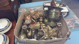 A box of brassware