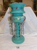 A Victorian hand decorated turquoise glass table lustre