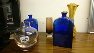 2 blue glass flasks and 3 other items of glass ware