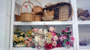 2 shelves of basket ware and artificial flowers