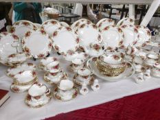 In excess of 70 pieces of Royal Albert Old Country Roses tea and dinner ware