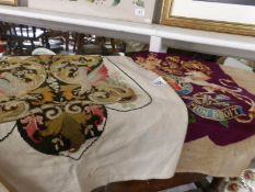 2 unframed heraldic tapestries