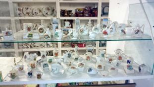 A large collection of crested china