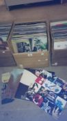 A box of classic rock LP records including  U2, Led Zeppelin, Pink Floyd,