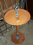 A vintage style metal bird table