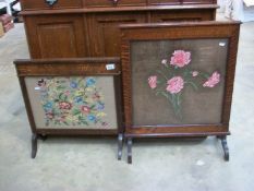 2 oak glazed fire screens with tapestry and silk floral panels