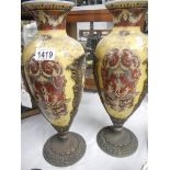 A pair of 19th century 'Renaissance' vases with spelter acanthus an spelter bases