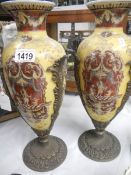 A pair of 19th century 'Renaissance' vases with spelter acanthus an spelter bases