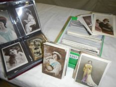 An excellent collection in an album and a box of in excess of 350 postcards of actors and actresses