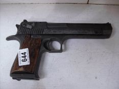 A replica hand gun