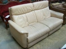 A beige leather settee