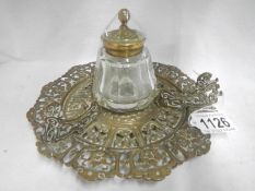 A brass and cut glass inkwell