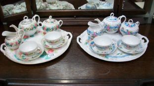 2 tea for two tea sets with floral decoration