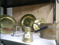 A mixed lot of brass ware including plates