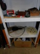 2 shelves and a box of fishing equipment including reels, flies,
