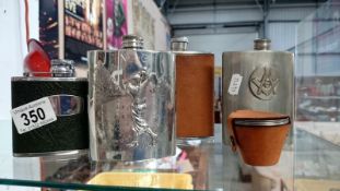 A mixed lot including Masonic hip flask, 3 others,
