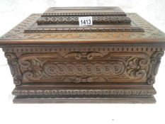 A carved camphor wood bible box,
