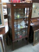 An Edwardian inlaid display cabinet