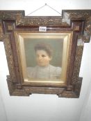 A Victorian hand tinted photograph in ornate frame a/f,