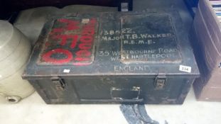 A tin trunk with markings