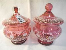 2 cranberry glass sweet jars hand decorated with white enamel