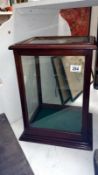 A mahogany display case