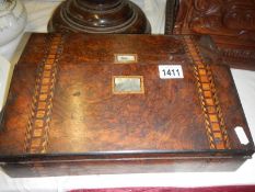 An early 19th century walnut inlaid writing box