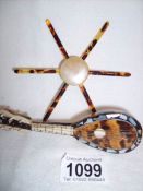 A miniature tortoise shell mandolin and one other item