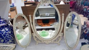 A painted oval framed triple dressing table mirror