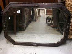 A large 1930's oak framed mirror